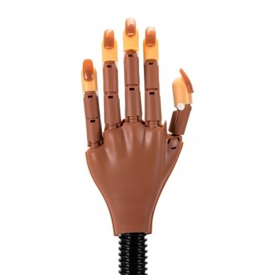 The hand is attached to the table 95 for manicure training 3